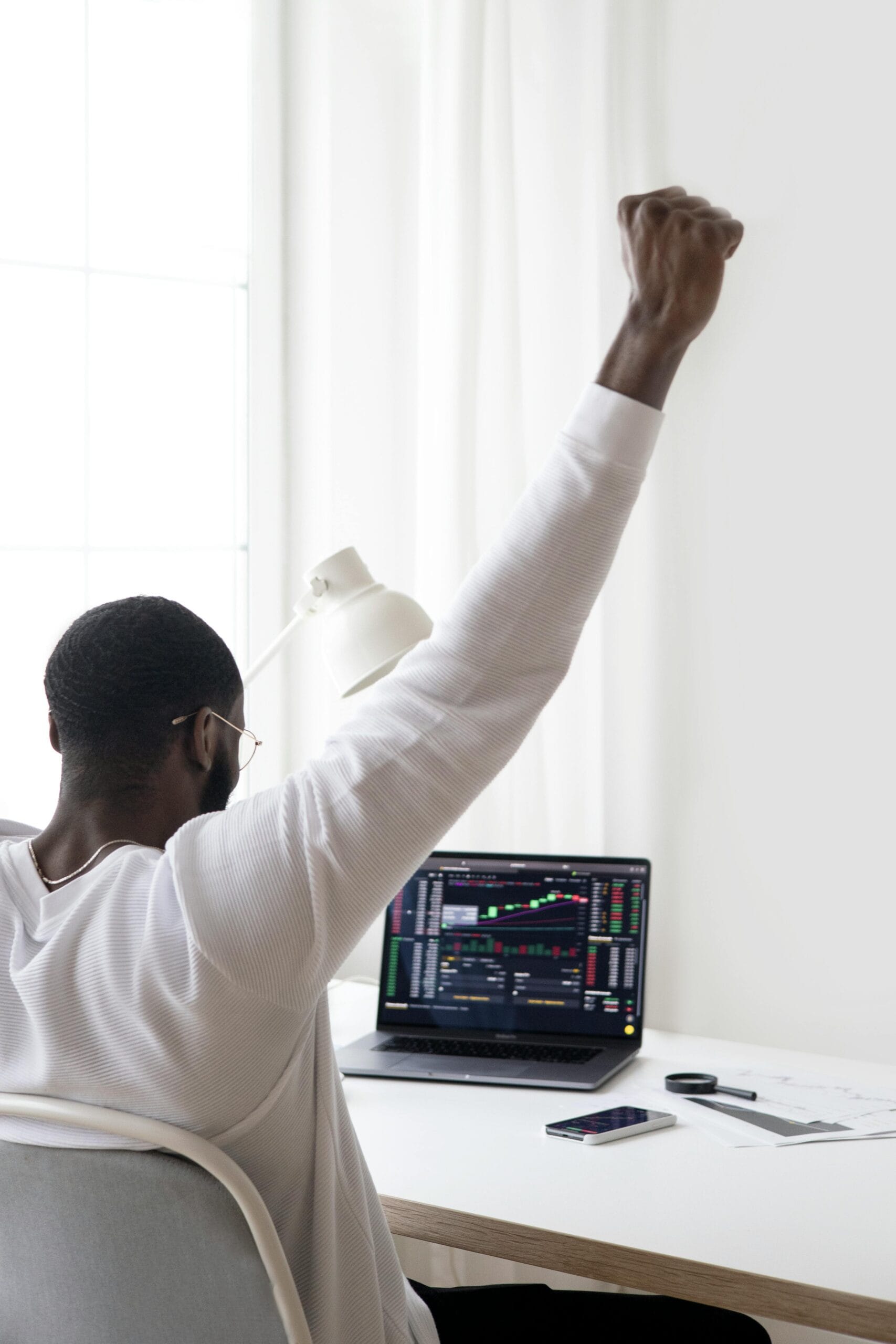 Successful Person Raising his Hand